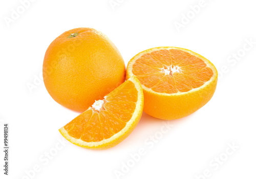 whole and half cut orange on white background