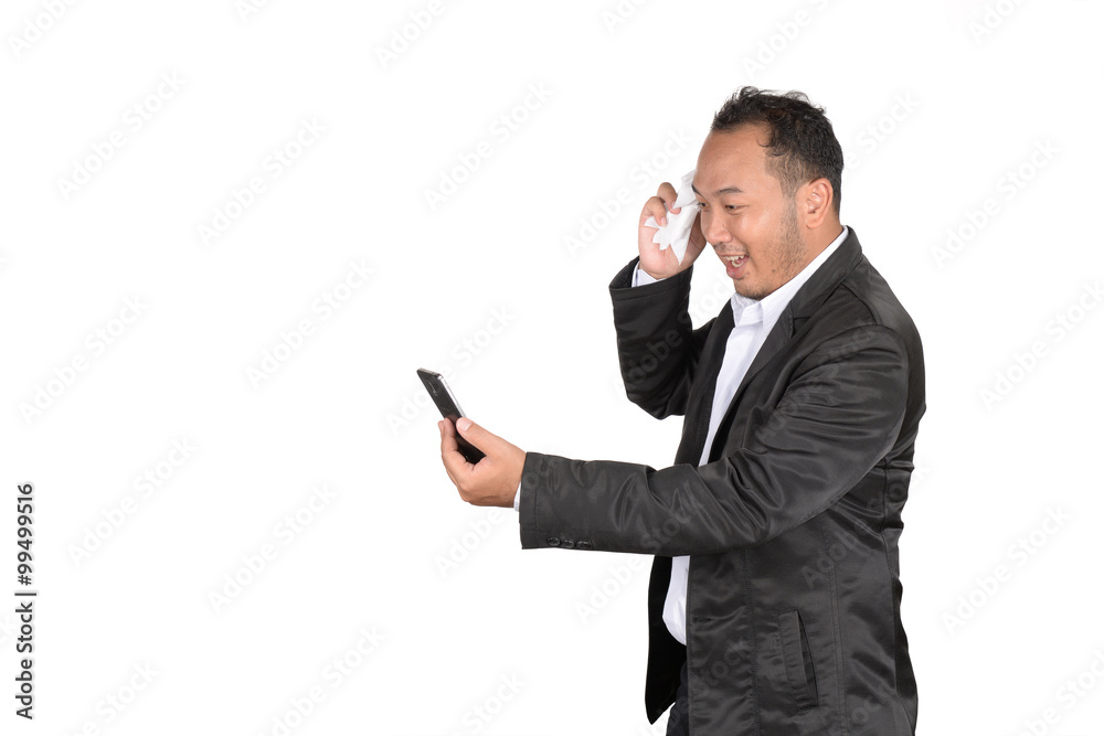 Businessmen are happy about the check stocks from a phone. Businessmen are happy about the check stocks from a phone.
