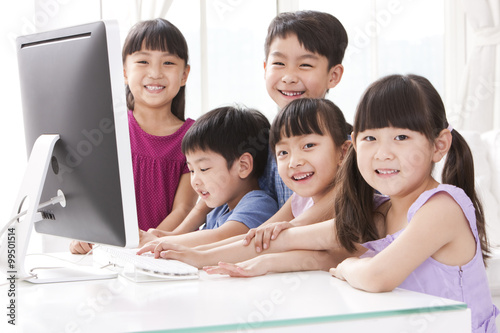 Children using computer at home