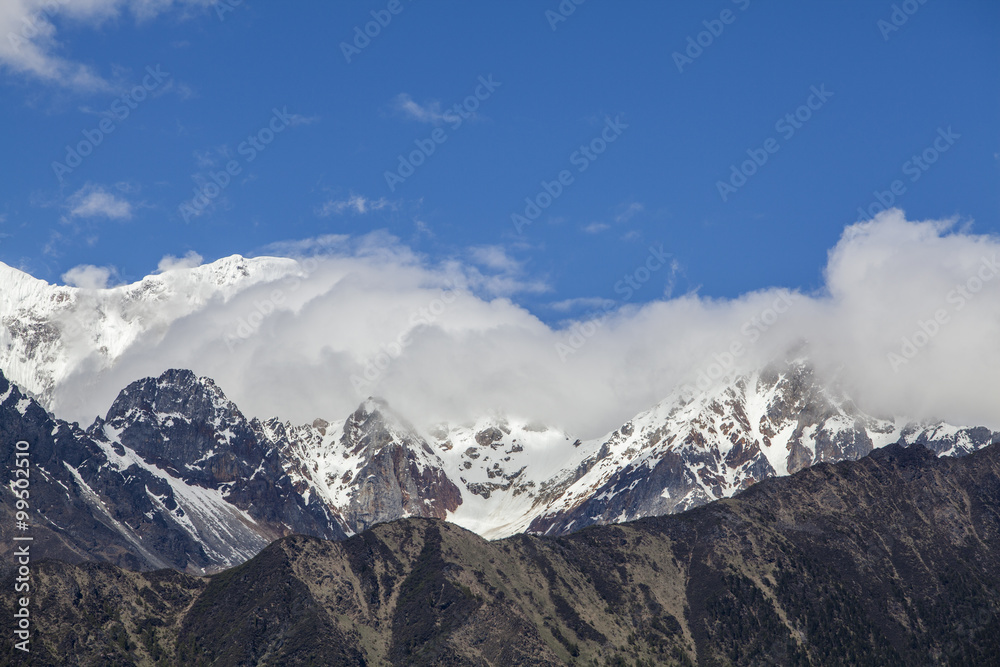 Blue sky and snow mountains in Tibet, China