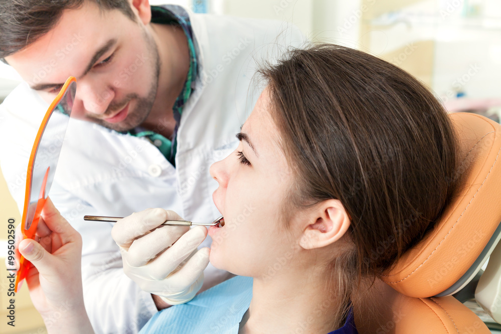 The girl on reception at the dentist's chair. The girl on reception at the dentist's chair.