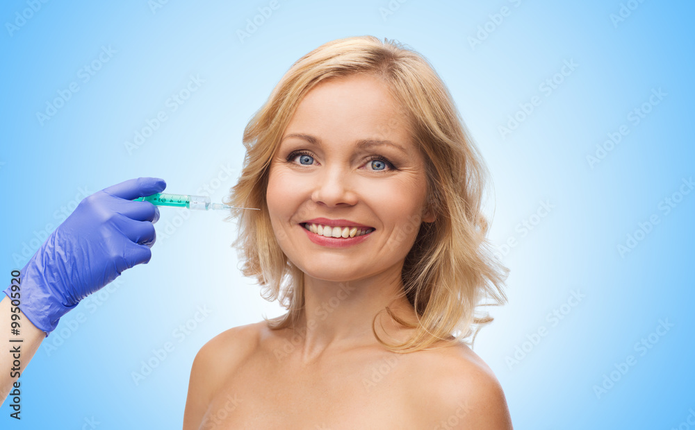 happy woman face and beautician hand with syringe happy woman face and beautician hand with syringe