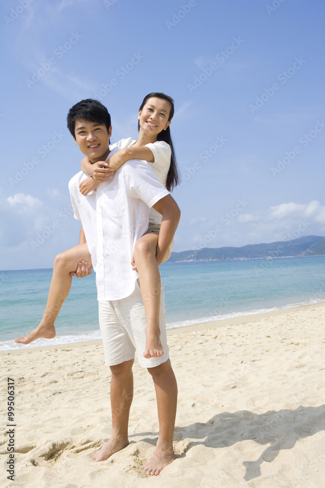 Portrait of a young couple on the beach Portrait of a young couple on the beach