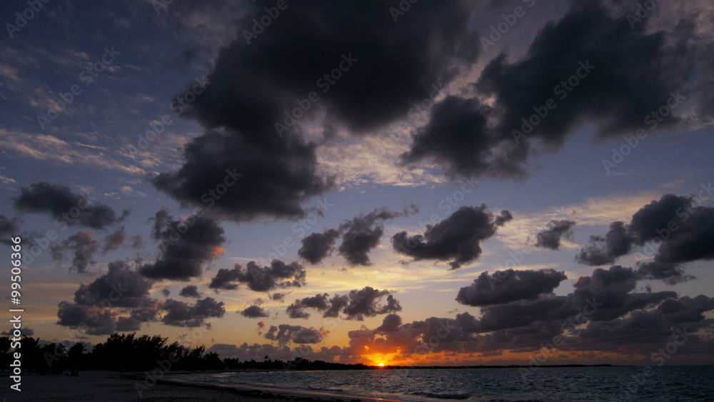 Tropical sunrise ocean waves on luxury sand beach Tropical sunrise ocean waves on luxury sand beach