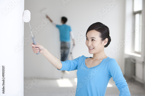 Couple painting together