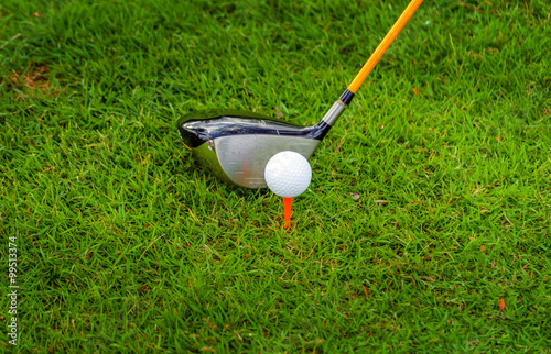 Golf Driver and Golf ball on green