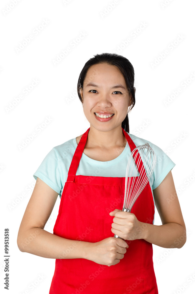Portrait of woman with red apron and stainless whisk ready to cooking,asian housewife Portrait of woman with red apron and stainless whisk ready to cooking,asian housewife