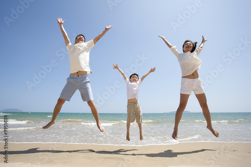 Family jumping up with joy