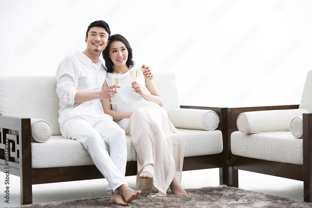 Cheerful young couple with champagne Cheerful young couple with champagne