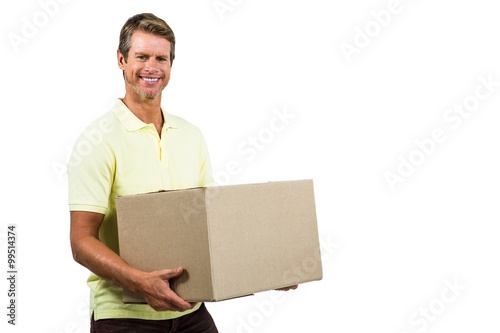 Portrait of smiling man holding box