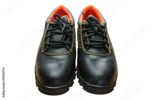 Black steel toe safety boots on white background.