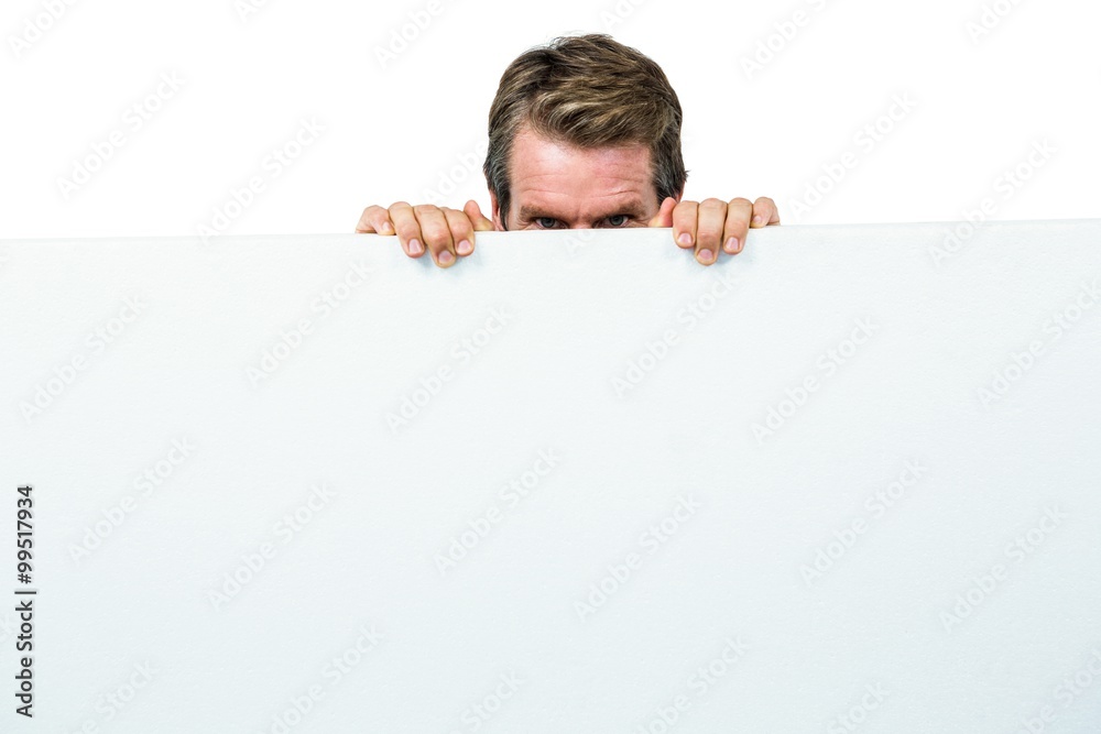Man hiding behind board Man hiding behind board
