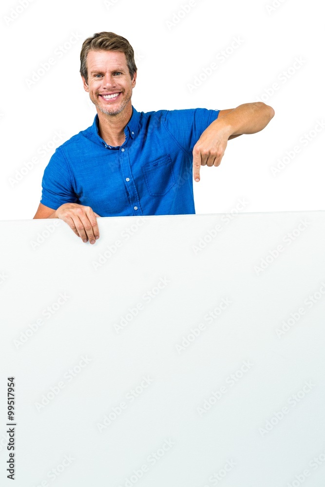 Smiling man holding board Smiling man holding board