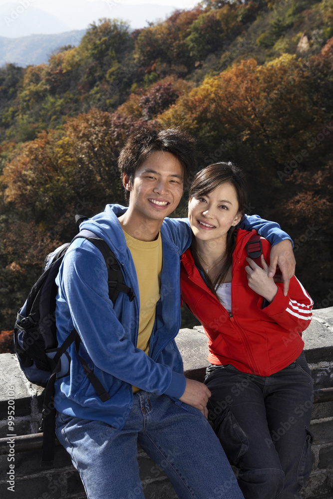 Young Couple Visiting The Great Wall Of China Young Couple Visiting The Great Wall Of China