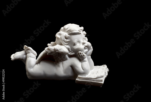 Canvastavla Little white guardian angel isolated on black background