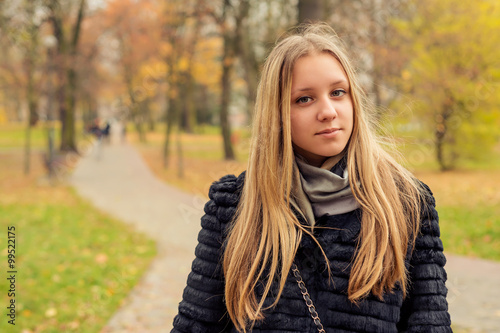 Portrait of teen girl in the autumn 