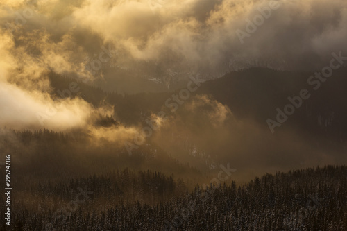 Winter sunset over the clouds - Panoramic view