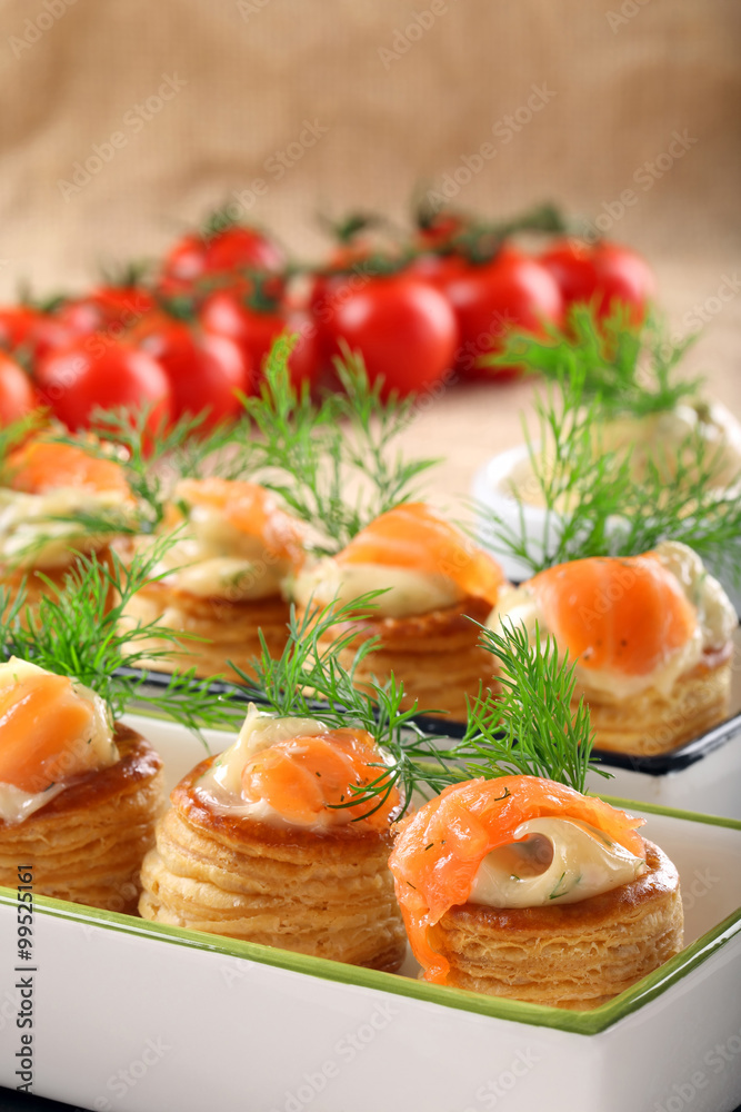 Appetizer puff pastry with dill dip and salmon Appetizer puff pastry with dill dip and salmon