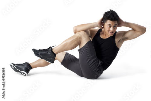Man exercising abdominals