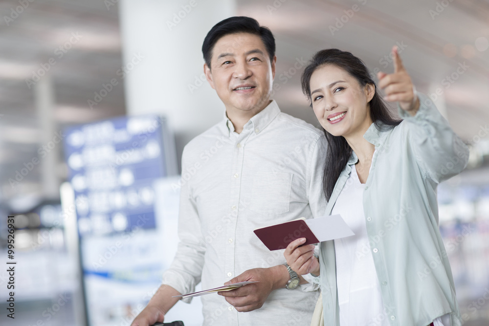 Mature couple at airport Mature couple at airport
