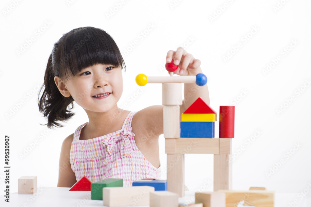 Little girl playing with building blocks Little girl playing with building blocks