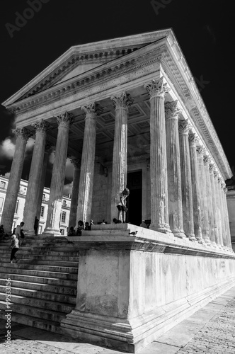 Roman temple Maison Carree in city of Nimes, France..