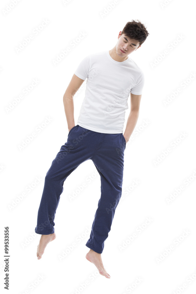 Young man sleeping in mid-air Young man sleeping in mid-air