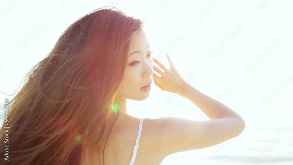 Portrait of happy Asian Chinese girl enjoying tropical island living Portrait of happy Asian Chinese girl enjoying tropical island living