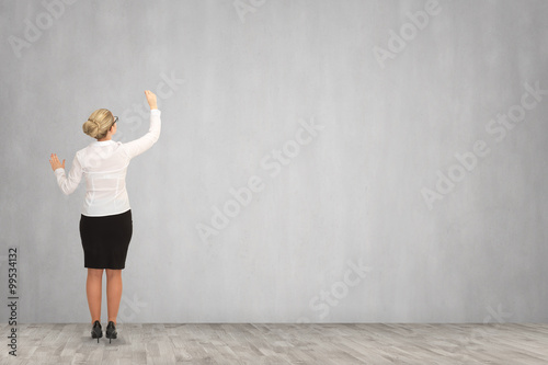 Business woman drawing on the wall. business concept  