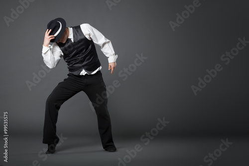 Fotografie Young male professional dancer dancing in studio.