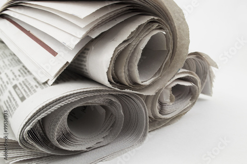 Heap rolls of newspapers

