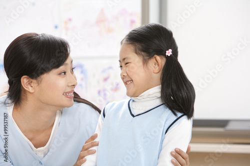 Teacher bonding with her student