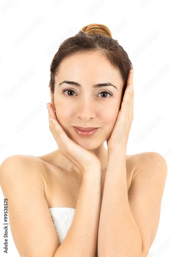 Woman stroking her clean facial skin Woman stroking her clean facial skin