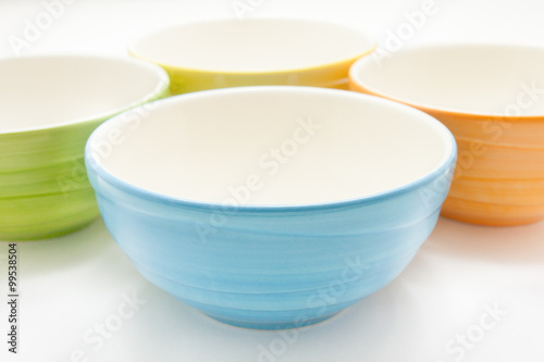 Small colorful ceramic bowl isolated over the white background