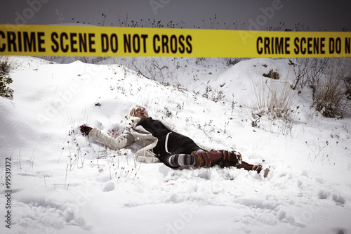 Body found on snow - police line - homicide photo