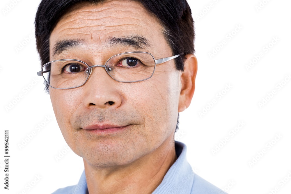Close-up portrait of confident man wearing eyeglasses Close-up portrait of confident man wearing eyeglasses