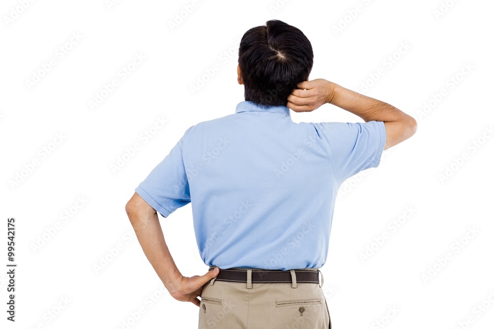 Rear view of man scratching head Rear view of man scratching head