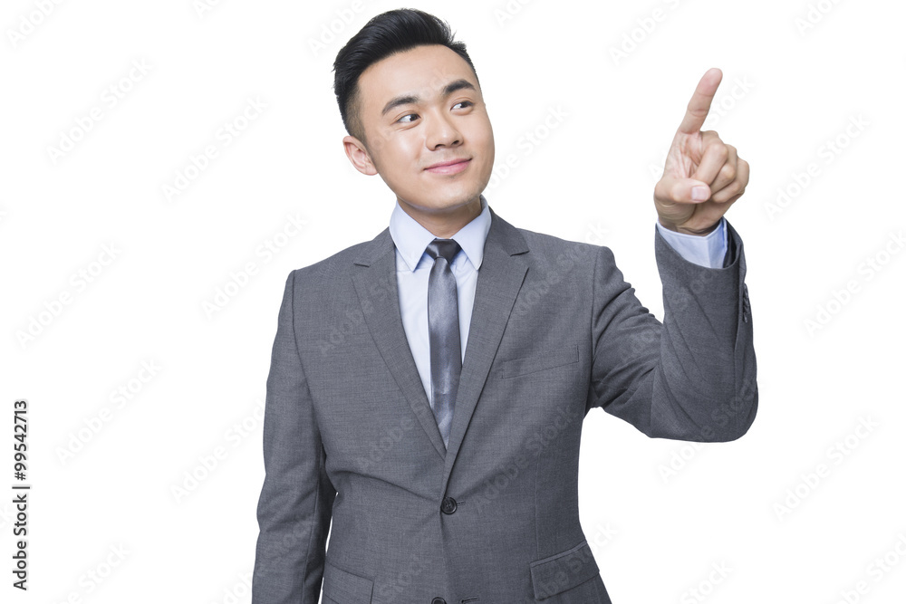 Young businessman using finger to point Young businessman using finger to point