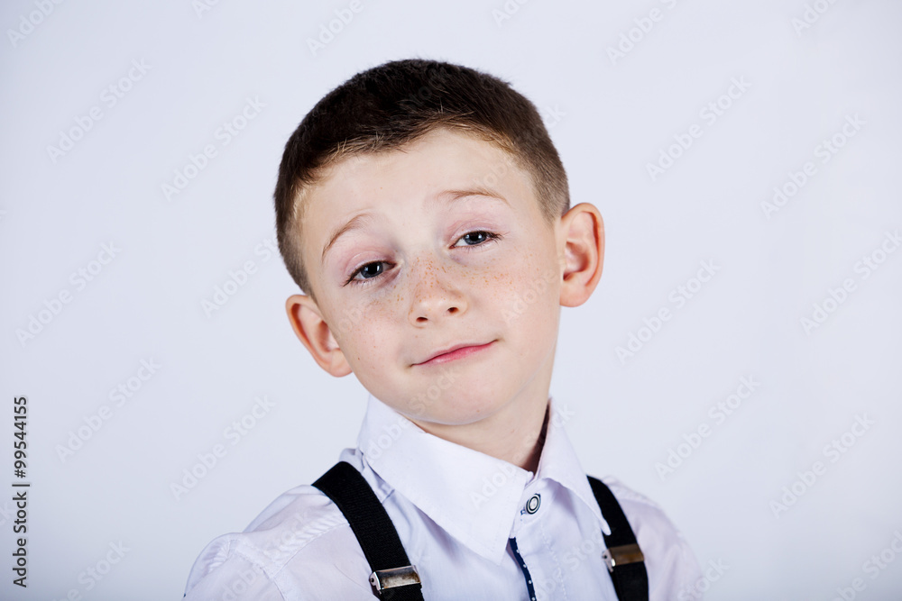 Confident little boy nerd isolated over yellow background. Confident little boy nerd isolated over yellow background.