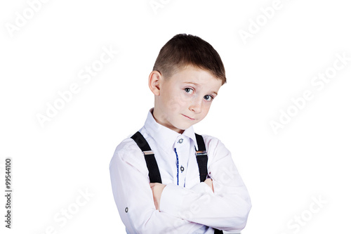 Little boy with wide open eyes looking to camera