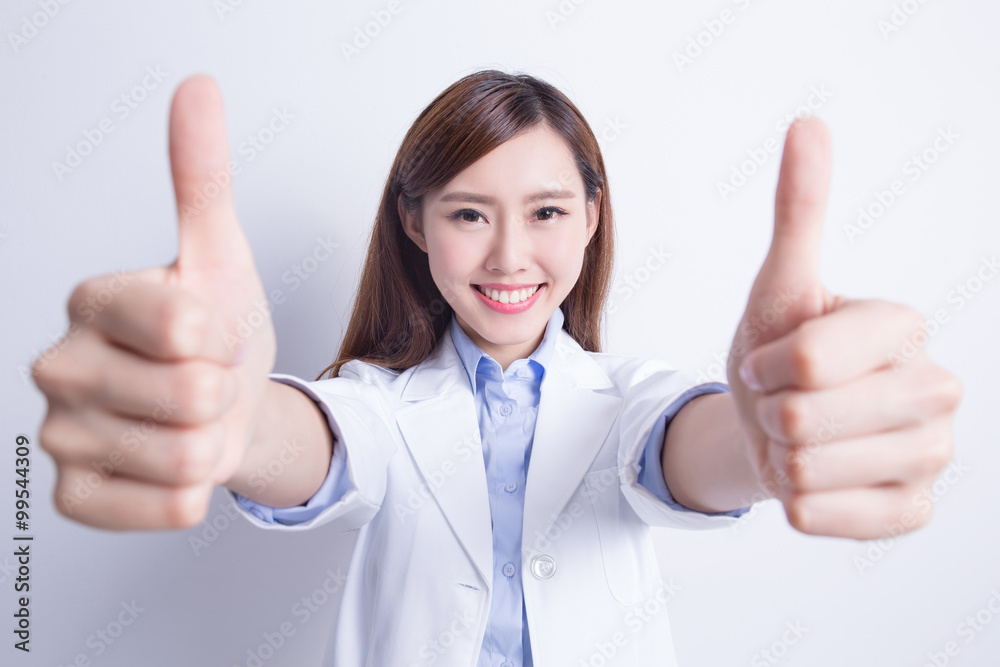 Smile woman doctor show thumb up Smile woman doctor show thumb up