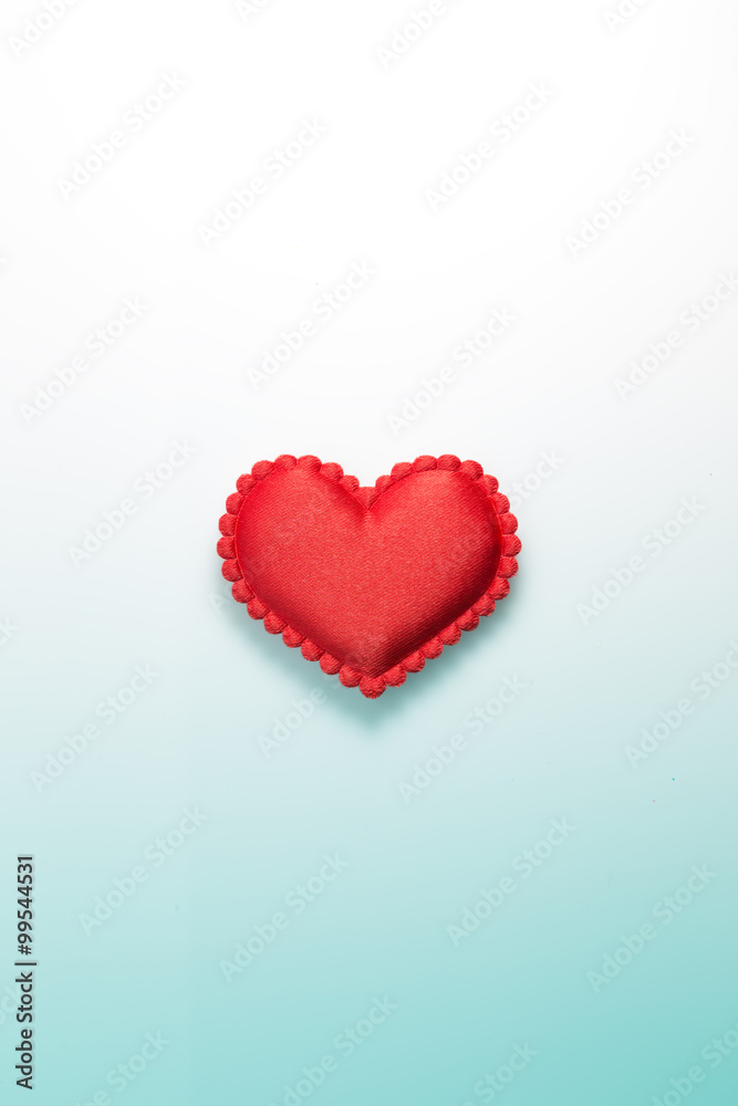 Single red heart on gradated background