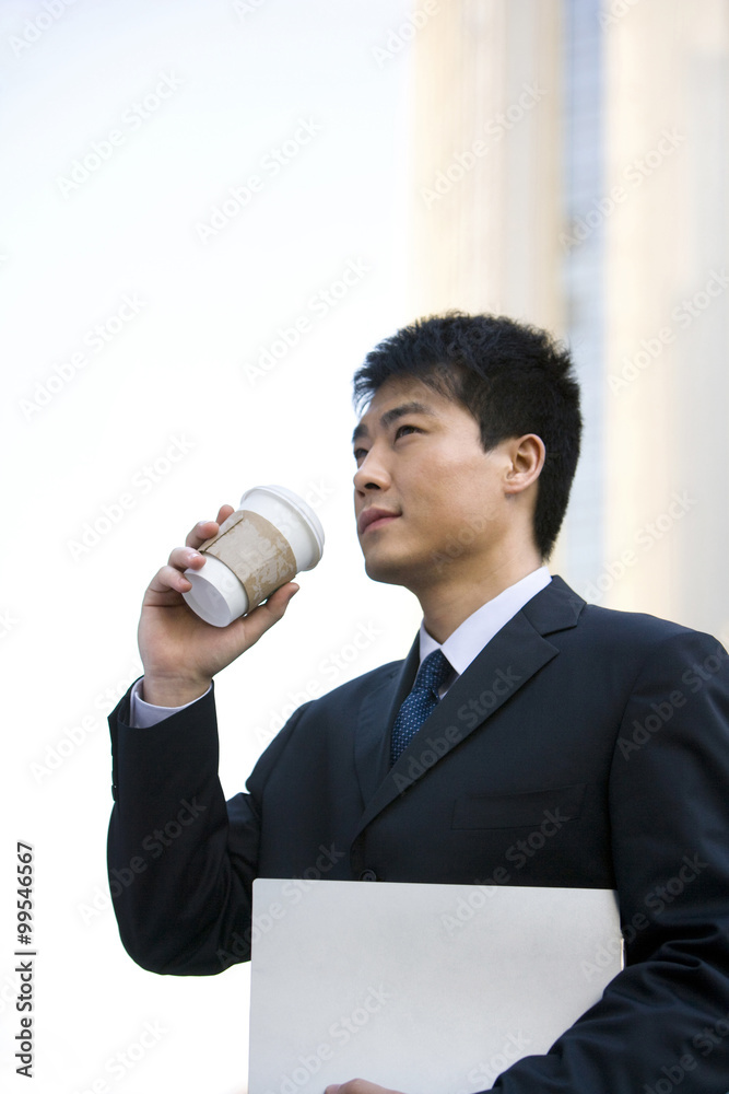 Man with coffee and documents
