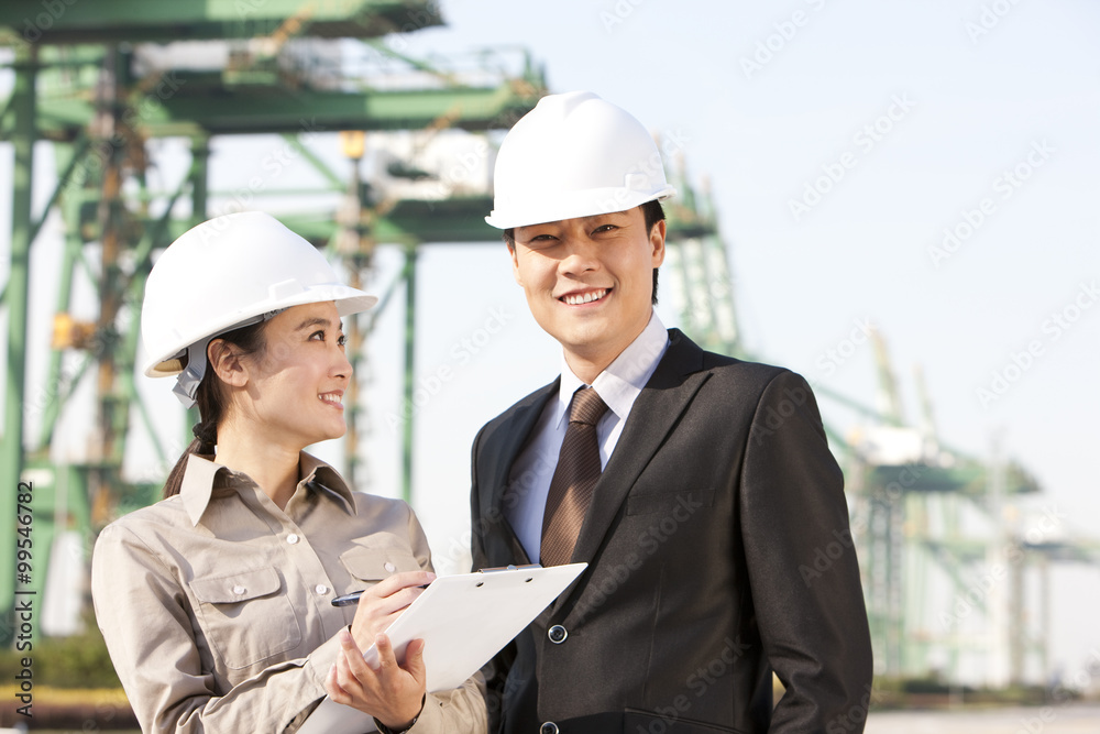 businessman with shipping industry worker