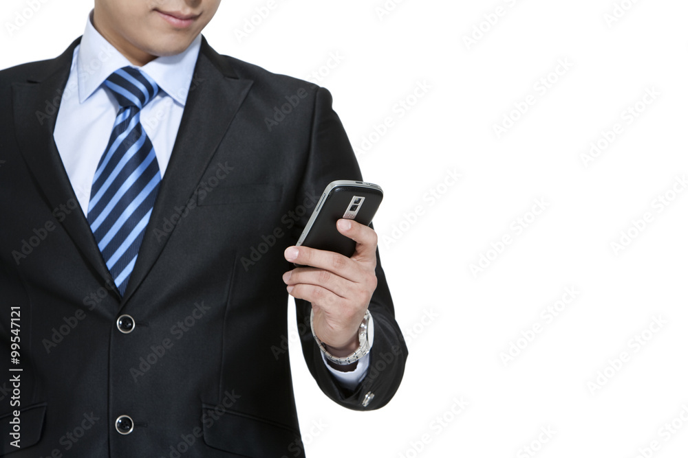 Businessman holding a mobile phone