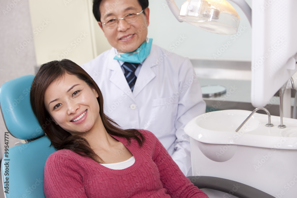 Obraz premium Dentist and patient in dental clinic