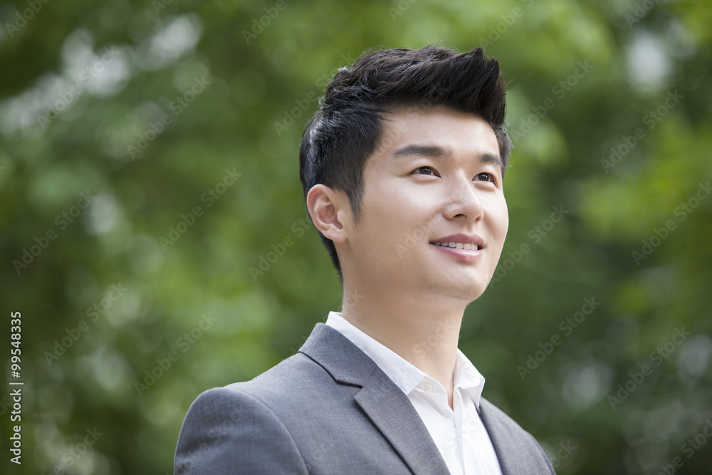 Young businessman looking at view Young businessman looking at view