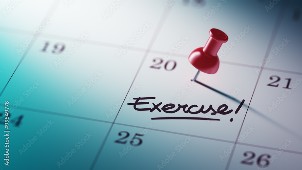 Concept image of a Calendar with a red push pin. Closeup shot of Concept image of a Calendar with a red push pin. Closeup shot of