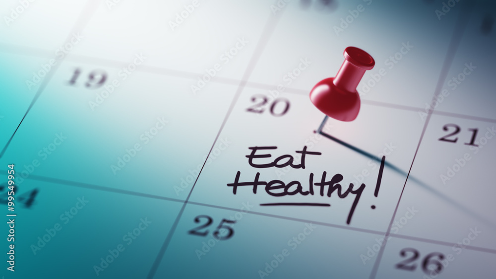 Concept image of a Calendar with a red push pin. Closeup shot of Concept image of a Calendar with a red push pin. Closeup shot of