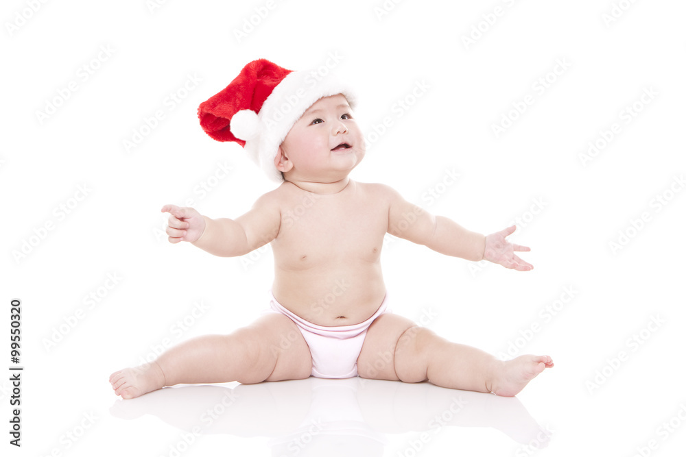 Cute baby girl with Christmas hat